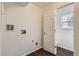 Utility room with hookups and open door revealing half bathroom at 20000 E Mitchell Pl # 39, Denver, CO 80249