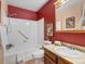 A charming bathroom featuring tiled walls, and ample vanity space at 1935 W 102Nd Ave, Thornton, CO 80260