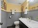 Charming bathroom with a stylish sink, wainscotting and attractive wall decor at 1935 W 102Nd Ave, Thornton, CO 80260