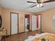 Bedroom with a doorway view into the en-suite bathroom with modern flooring at 1935 W 102Nd Ave, Thornton, CO 80260