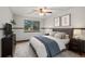 Well-lit bedroom featuring hardwood floors, a large window, and contemporary design at 1935 W 102Nd Ave, Thornton, CO 80260