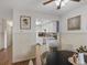Charming kitchen with white cabinetry and views into the dining area. Ready to entertain! at 1935 W 102Nd Ave, Thornton, CO 80260