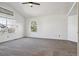 Open bedroom with neutral carpet, vaulted ceilings, and updated paint at 17040 Numa Pl, Parker, CO 80134
