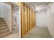 Unfinished basement featuring exposed framing, concrete floors, and visible utilities, ready for customization and expansion at 2552 Stonewall Ln, Lafayette, CO 80026