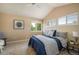 Inviting bedroom with vaulted ceiling, plush carpet, and a large window with scenic views at 2552 Stonewall Ln, Lafayette, CO 80026
