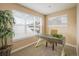 Bright office space with a modern desk, large windows, and natural light at 2552 Stonewall Ln, Lafayette, CO 80026