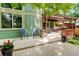 An inviting backyard space with a pergola-covered seating area, offering a relaxing outdoor living experience at 10966 W Half Moon Pass, Littleton, CO 80127