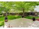 A spacious backyard featuring a well-maintained lawn, a wooden fence, and a lovely deck area perfect for entertaining at 10966 W Half Moon Pass, Littleton, CO 80127