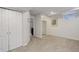 Finished basement area, including a bathroom, closet, and closet space at 10966 W Half Moon Pass, Littleton, CO 80127