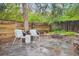 Charming backyard with stone patio, fire pit, and cozy seating area at 5405 S Lowell Blvd, Littleton, CO 80123