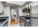 Functional kitchen providing easy access to the living room area at 4671 S Decatur St # 232, Englewood, CO 80110