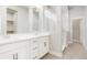 Bathroom features double sinks, a tiled shower with glass door at 20968 E 60Th Pl, Aurora, CO 80019