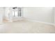 Spacious bedroom with neutral carpet and a large window, providing lots of light at 20968 E 60Th Pl, Aurora, CO 80019