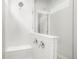 Walk-in shower featuring subway tile and brushed chrome fixtures at 20968 E 60Th Pl, Aurora, CO 80019