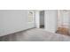 Comfortable bedroom boasts neutral walls, new carpet, and a view of the community at 7016 E 126Th Pl, Thornton, CO 80602