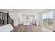 Bright, white kitchen features modern appliances, an island and leads out to the deck at 7016 E 126Th Pl, Thornton, CO 80602