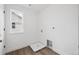 Practical laundry room boasts hookups, a window, and tile flooring at 7016 E 126Th Pl, Thornton, CO 80602