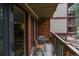 Cozy balcony featuring an outdoor seating area overlooking lush greenery at 805 Columbine Rd # 105, Breckenridge, CO 80424
