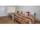 Bedroom with two beds featuring rustic wood frames and patterned bedding, offering a cozy and inviting space at 805 Columbine Rd # 105, Breckenridge, CO 80424