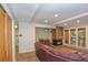 Open-concept living area with a fireplace, dining space, and view into the kitchen at 805 Columbine Rd # 105, Breckenridge, CO 80424