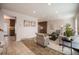 Spacious living room with tiled flooring, natural light, and comfortable seating at 11073 Newland St, Westminster, CO 80020