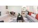 Well-lit living room featuring a stylish coffee table, modern decor, and views of the room's decor at 7453 E Jefferson Dr, Denver, CO 80237