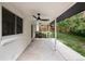 Covered patio featuring a ceiling fan and a view of the backyard at 7453 E Jefferson Dr, Denver, CO 80237