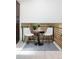 Stylish sitting area features natural light, high ceilings and a decorative plant centerpiece at 7453 E Jefferson Dr, Denver, CO 80237