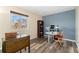 Bedroom that has been converted into an office, with nice floors and a bright window at 11936 W Temple Dr, Morrison, CO 80465