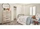 Cozy and inviting bedroom with cheerful decor and ample natural light offers a comforting and relaxing space at 13342 Blue Amber Ct, Parker, CO 80134