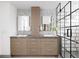 Modern bathroom with double vanity, geometric tile, and a glass-enclosed shower at 1467 Delgany St # 1, Denver, CO 80202
