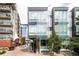 Contemporary townhome showcasing a unique facade with modern architectural details at 1467 Delgany St # 1, Denver, CO 80202