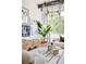 Bright living room features large windows, modern decor, and stylish furniture at 1467 Delgany St # 1, Denver, CO 80202