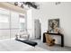 Bright bedroom with desk space and view of an exterior building through a large window at 1467 Delgany St # 1, Denver, CO 80202