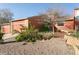 Charming home featuring a two-car garage, brick accents, and a well-maintained front yard at 2901 W Rowland Ave, Littleton, CO 80120