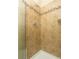 The walk in shower features beautiful tile work and built in shelving at 2901 W Rowland Ave, Littleton, CO 80120