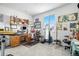 Inviting home office with built-in shelving and a desk at 17217 E Exposition Dr, Aurora, CO 80017