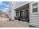 Cozy covered patio with string lights, offering a relaxing outdoor space at 17217 E Exposition Dr, Aurora, CO 80017