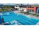 Large community pool with lap lanes, a shallow end, and plenty of lounge space at 5015 N Quemoy St, Aurora, CO 80019