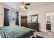 Comfortable bedroom featuring a ceiling fan and a window with blinds at 5332 13Th St, Frederick, CO 80504