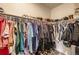 Well-organized walk-in closet with shelves and hanging rods at 5332 13Th St, Frederick, CO 80504