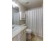 Clean bathroom with shower/tub combo and white vanity at 1176 E 130Th Ave # C, Thornton, CO 80241