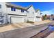 Attached garage with additional parking in front at 1176 E 130Th Ave # C, Thornton, CO 80241