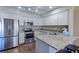 Modern kitchen featuring stainless steel appliances and granite countertops at 1176 E 130Th Ave # C, Thornton, CO 80241