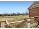 A brick home with a back porch overlooking the yard and neighborhood at 3026 W Prentice Ave # G, Littleton, CO 80123