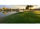 Scenic pond with ducks on the water's edge next to the grassy golf course at 3026 W Prentice Ave # G, Littleton, CO 80123