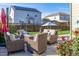 Relaxing backyard patio with comfortable seating, creating an inviting outdoor living space at 697 Gamble Oak St, Brighton, CO 80601