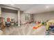 Large finished basement featuring plush carpet, neutral gray walls and a small window for light at 697 Gamble Oak St, Brighton, CO 80601