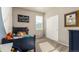 bedroom with a blue twin bed, gray walls, plush carpet and a window with blinds at 697 Gamble Oak St, Brighton, CO 80601
