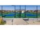 Outdoor pickleball courts with well-maintained surfaces and surrounding fencing for recreational enjoyment at 697 Gamble Oak St, Brighton, CO 80601